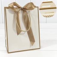 Пакет подарочный с лентой 18*23*10 210г Белый 1/10 1/160 Арт: 000504E/1 - Пакет подарочный с лентой 18*23*10 210г Белый 1/10 1/160 Арт: 000504E/1